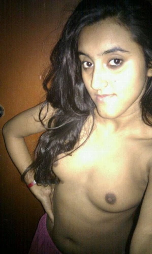 Indian skinny slut showing her small tits