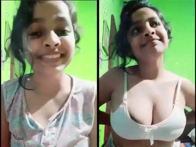 Cute Indian girl showing her big