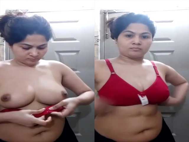 beautiful housewife trying new bra