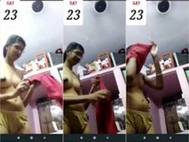 slim south Indian girl changing dress on video